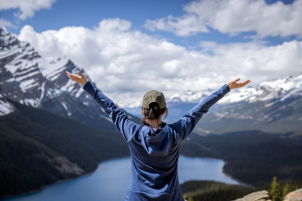 Young Woman Looking at the View of Peyto Lake in Banff National Park, Alberta, Canada