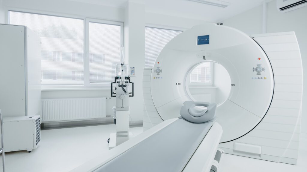 Medical CT or MRI or PET Scan Standing in the Modern Hospital Laboratory. Technologically Advanced and Functional Mediсal Equipment in a Clean White Room.